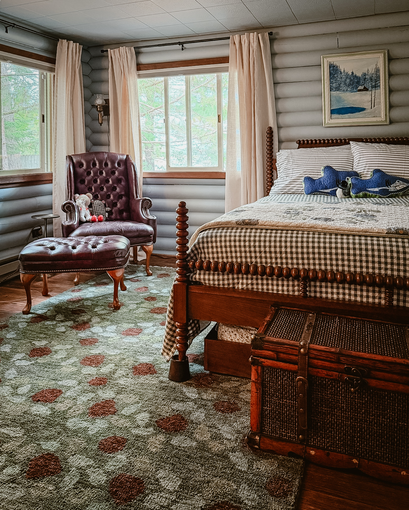 The first bedroom from another angle, with warm wood paneling